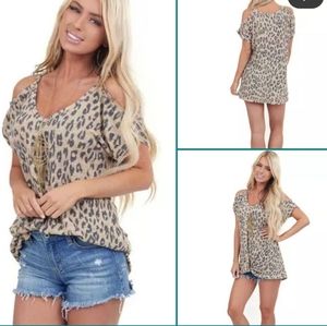 Leopard cold shoulder top with front twist, size medium